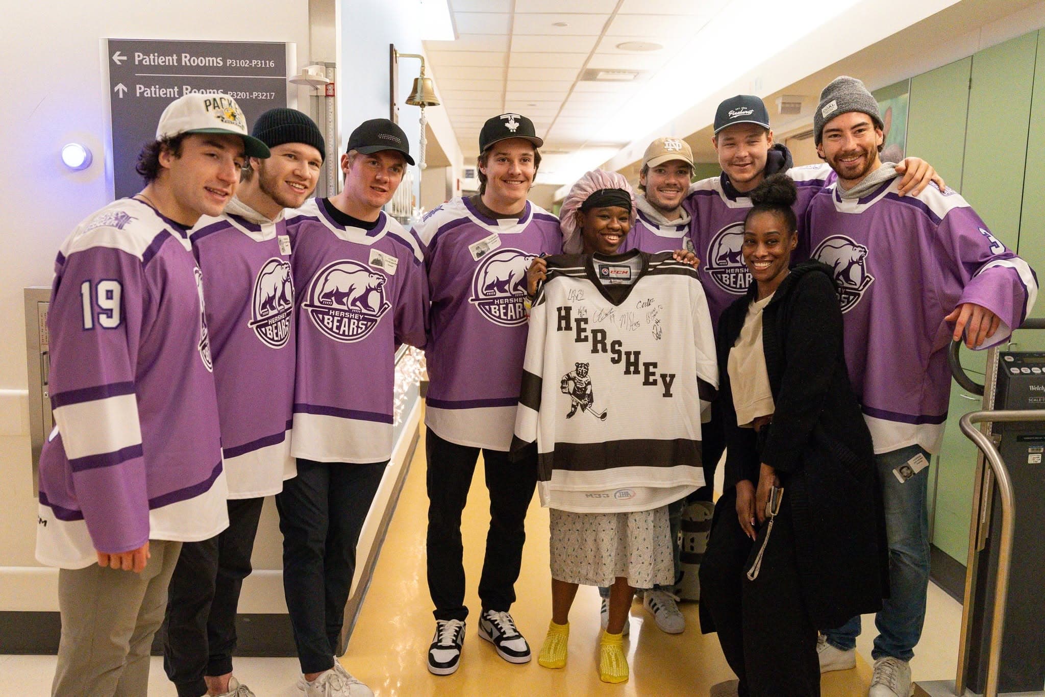 Bears team members at a community event.