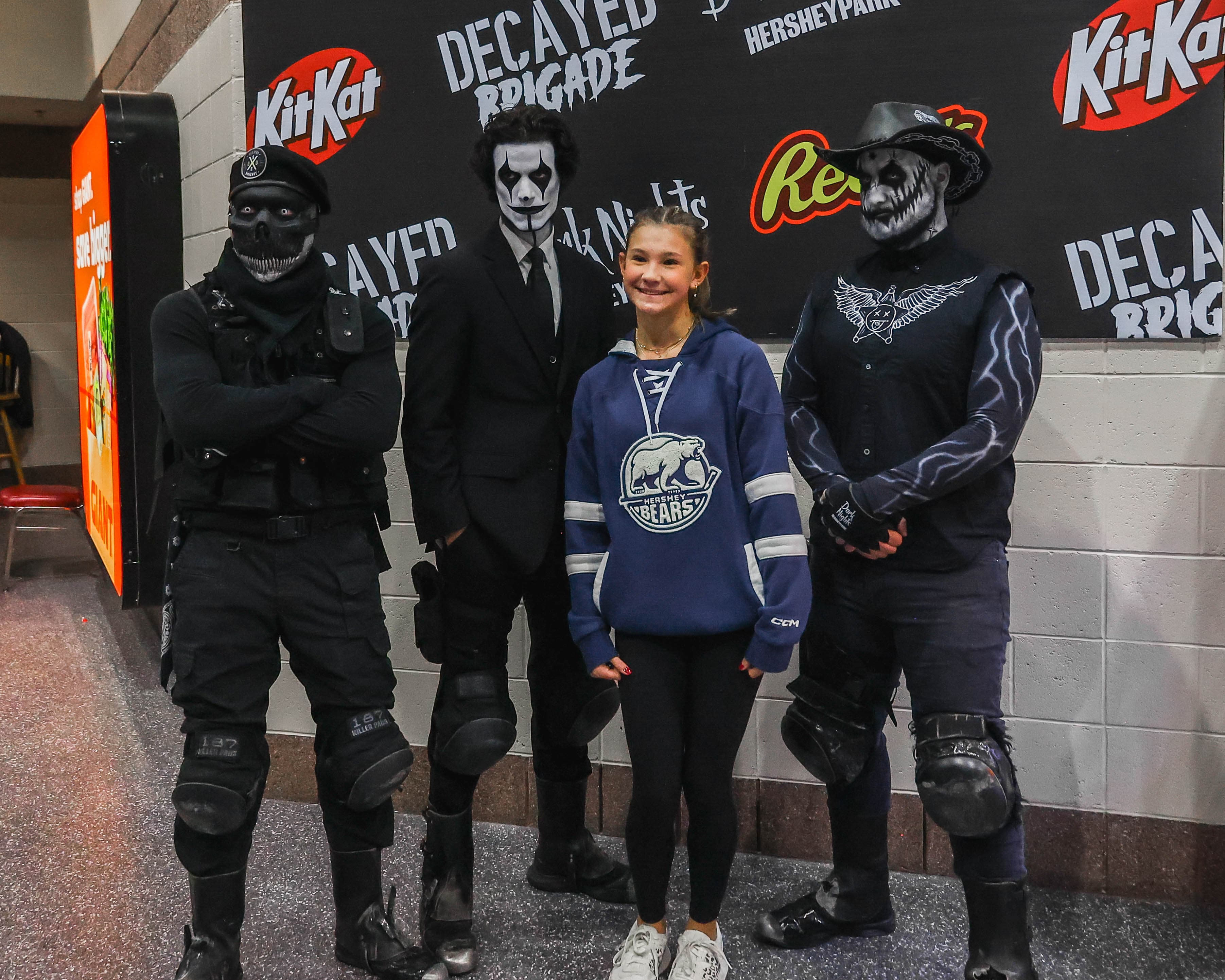 A young fan with scare actors at the South End Fan Zone at GIANT Center.
